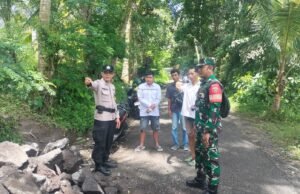 Pengawasan Ketat di Desa Bunutin: Babinsa dan Bhabinkamtibmas Awasi Pendataan Warga Pendatang