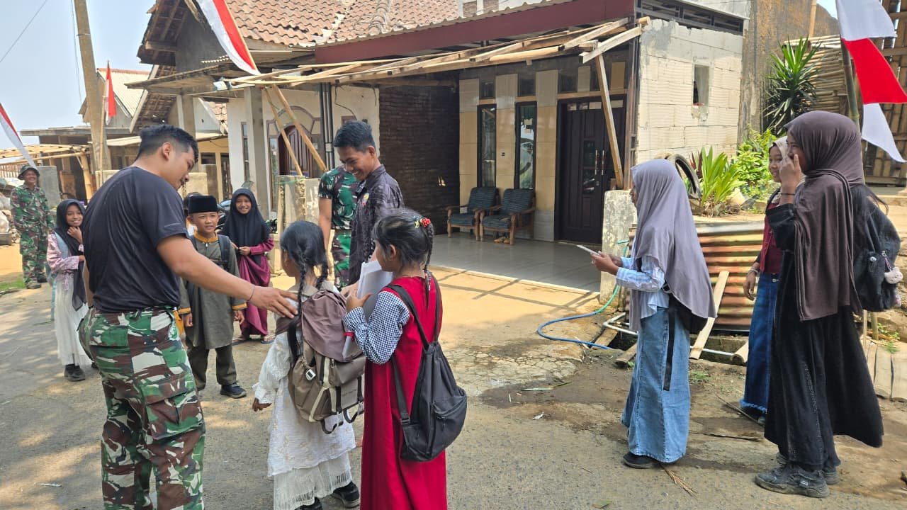 Satgas TMMD ke-130 Hibur Anak SD dengan Canda di Desa Taji
